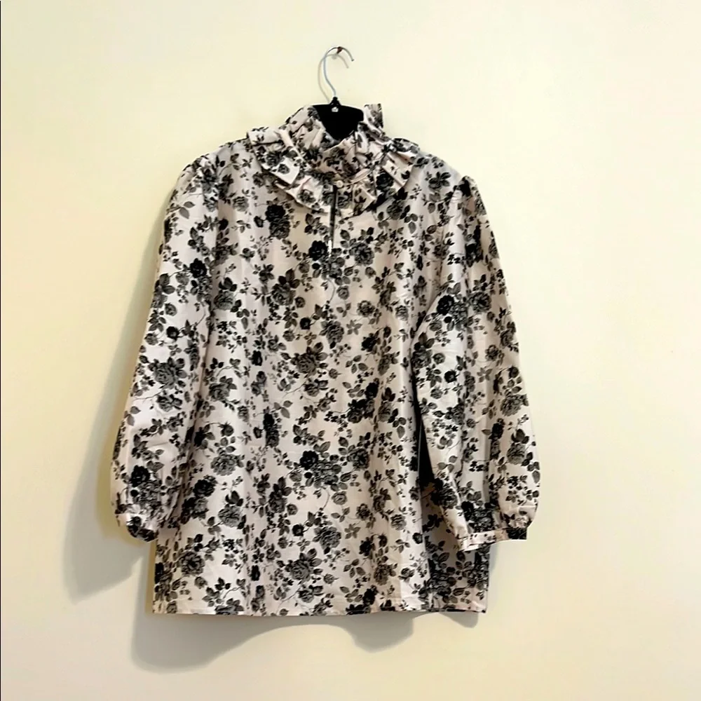 Tuckernuck Black Floral Ruffle-Neck Blouse on Cream